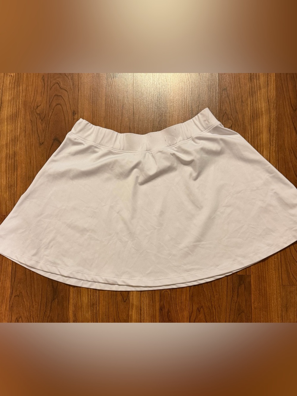 Tail white tennis skirt 14 inches long size medium